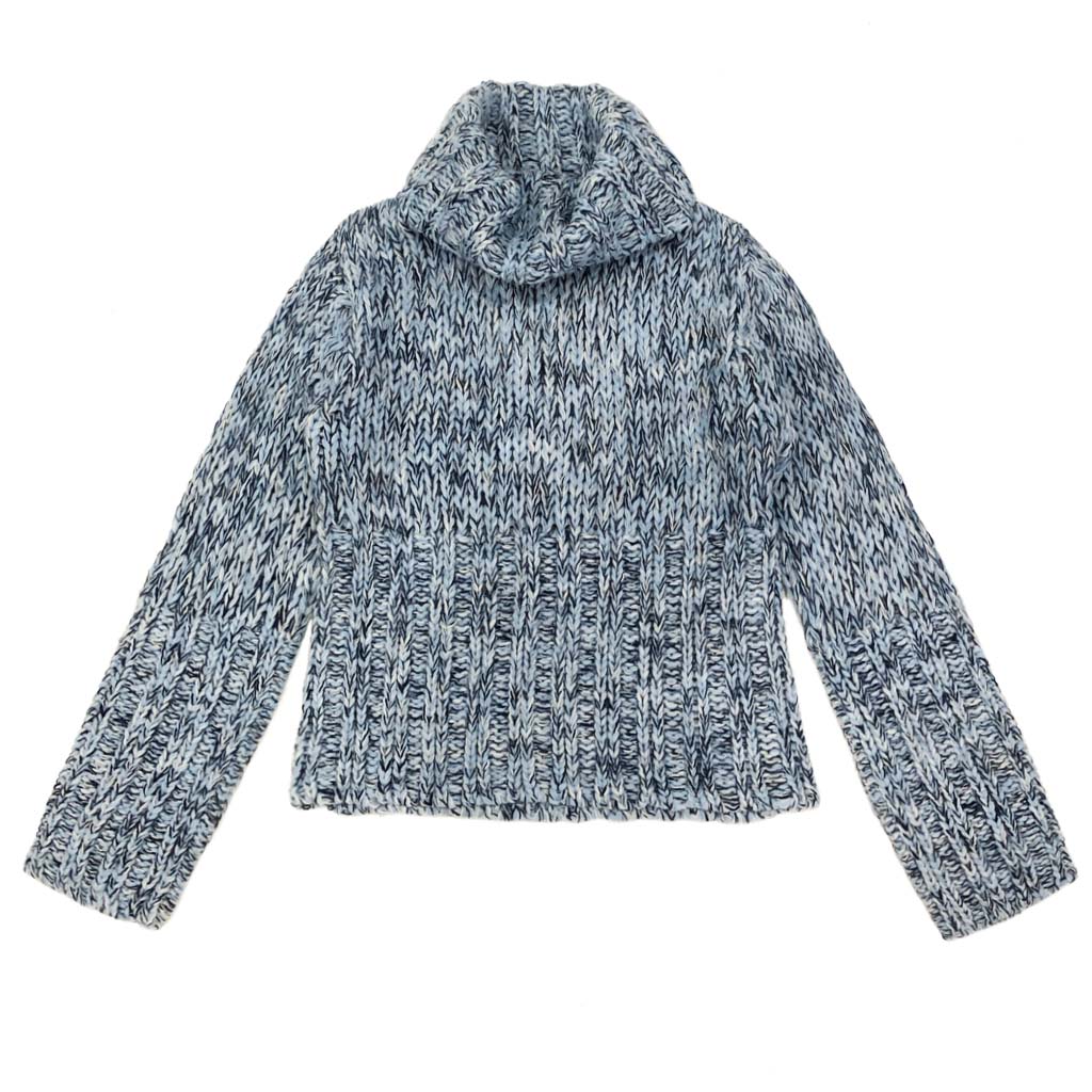 Soft-touch long sleeve turtleneck offering wool-like comfort and appearance.