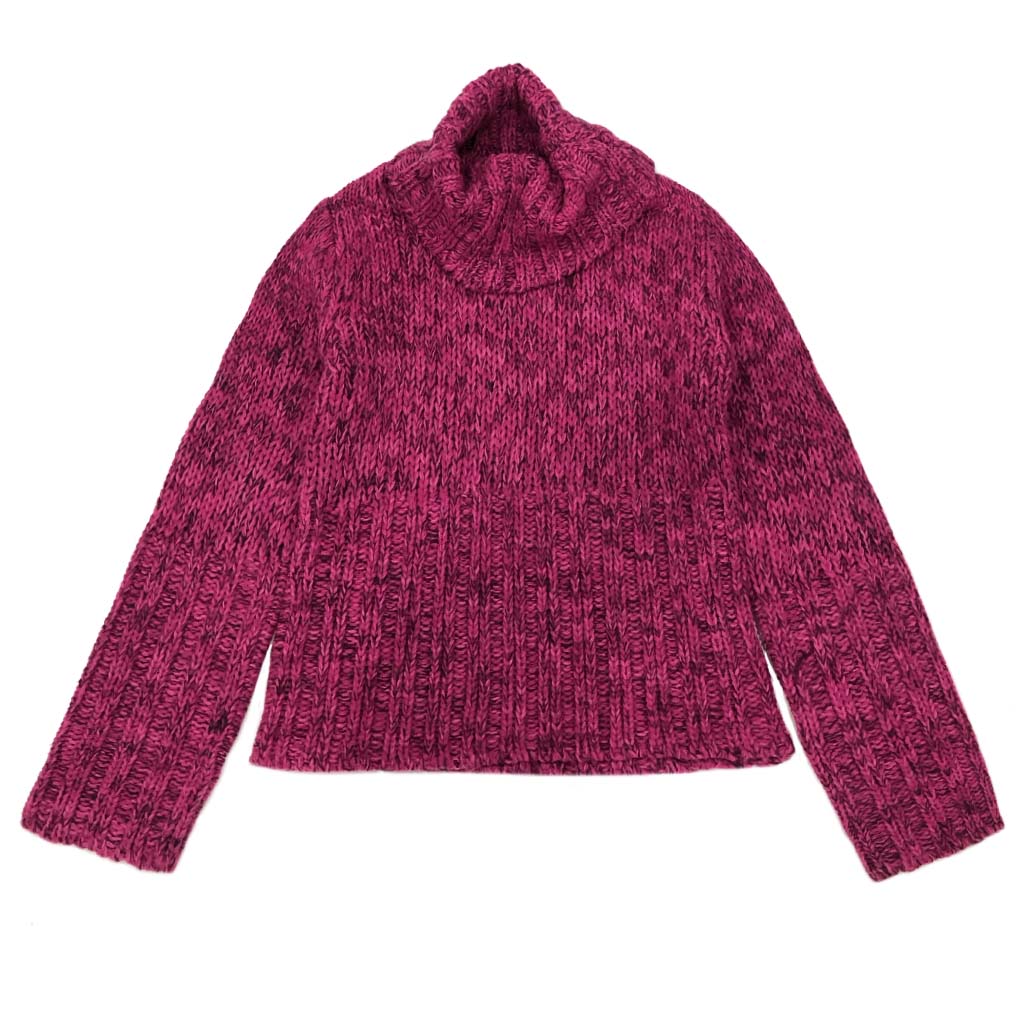 Soft-touch long sleeve turtleneck offering wool-like comfort and appearance.