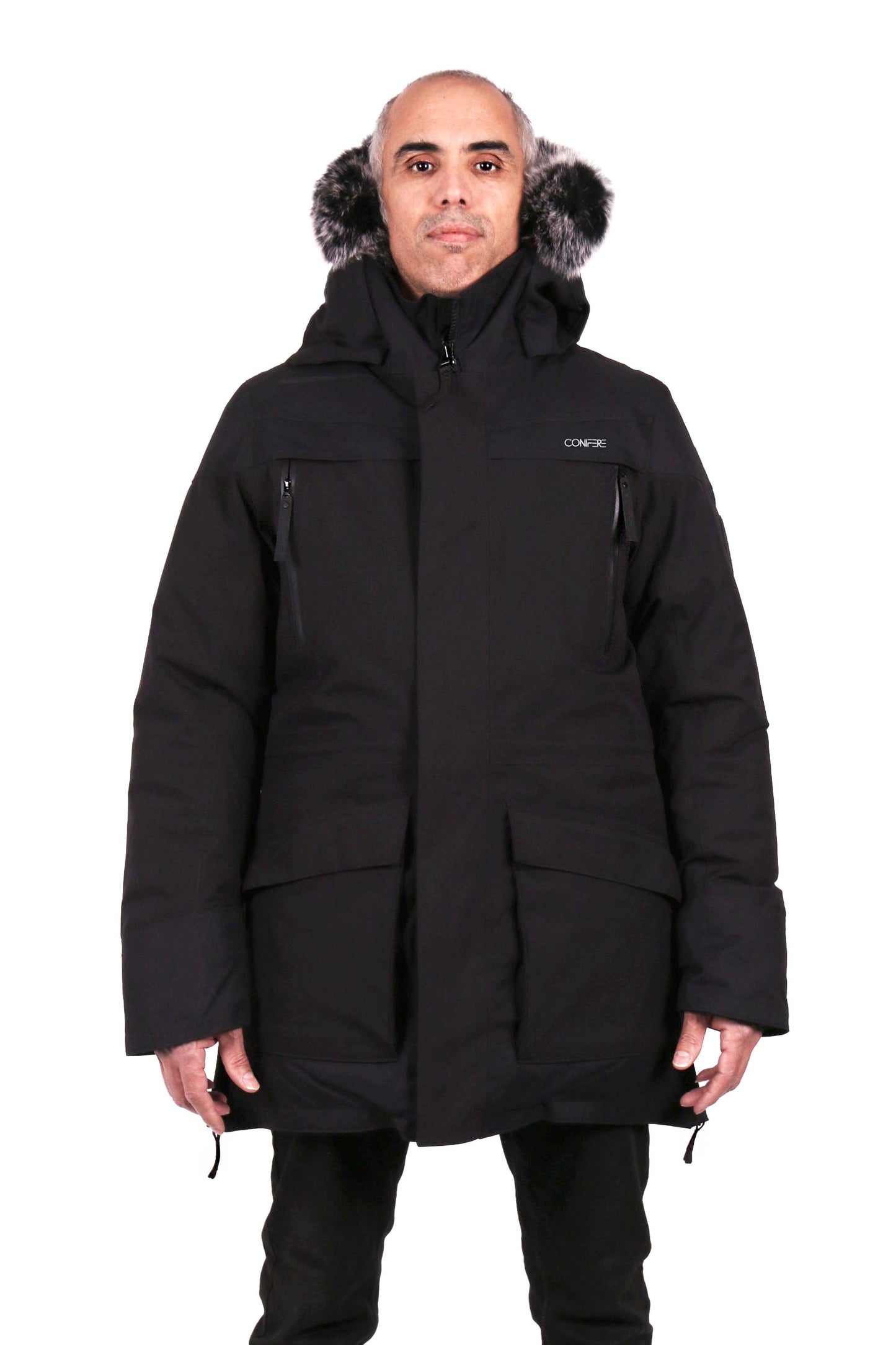 Durable men's parka designed for peak winter performance. Water resistant shell, wind stopper panel, detachable faux fur hood, quilted fleece lining, adjustable cuffs, YKK zipper, functional pockets.
