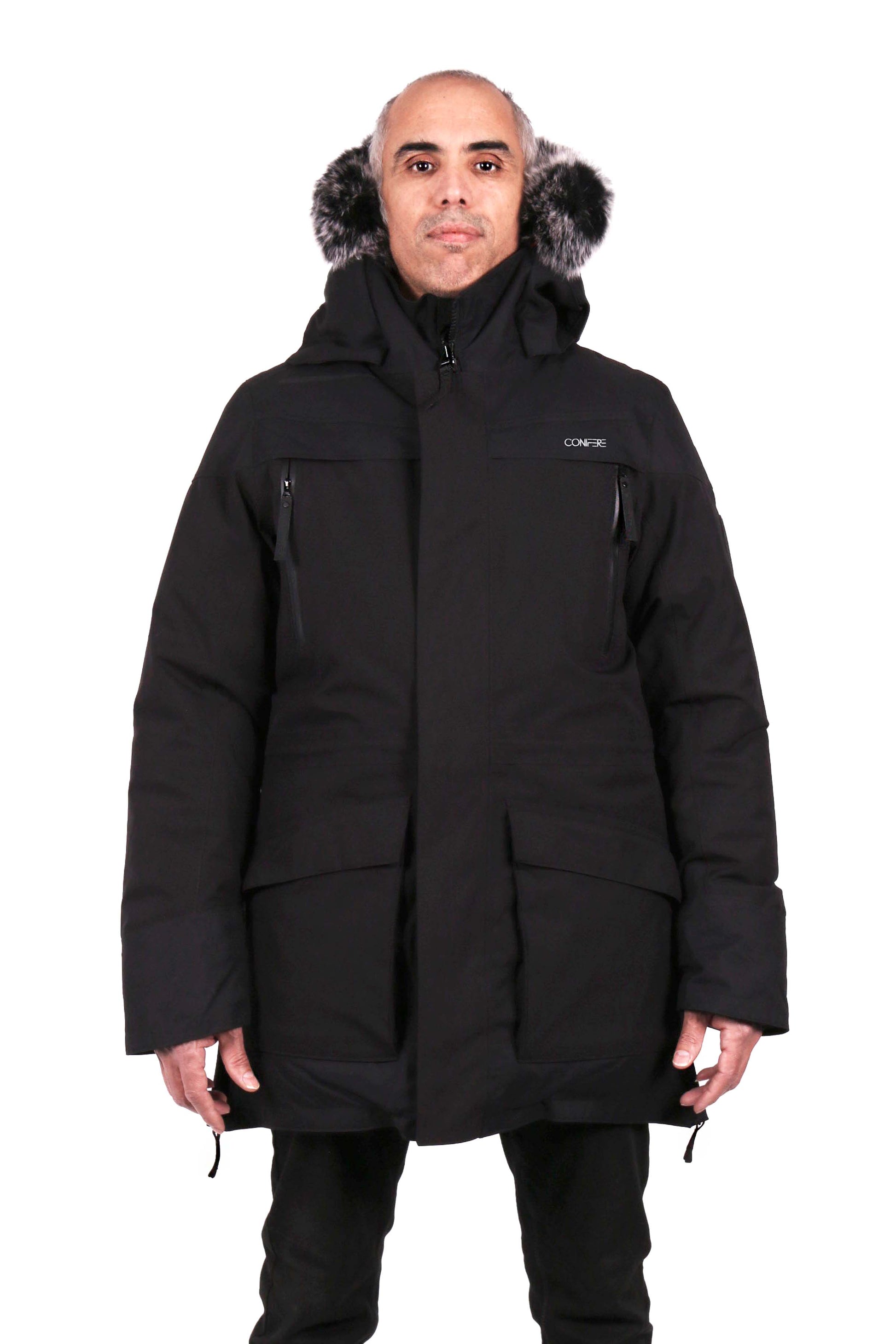 Durable men's parka designed for peak winter performance. Water resistant shell, wind stopper panel, detachable faux fur hood, quilted fleece lining, adjustable cuffs, YKK zipper, functional pockets.